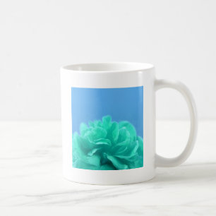 Farbenfrohe blaugrüne Blüte Tasse