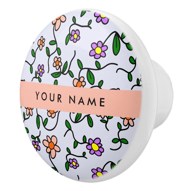 Farbenfrohe Blume, blauer Hintergrund, orange Keramikknauf (Rechts)