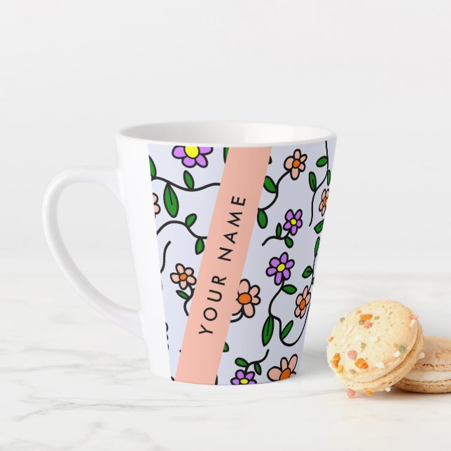 Farbenfrohe Blume, blauer Hintergrund, orange Milchtasse (Beispiel)