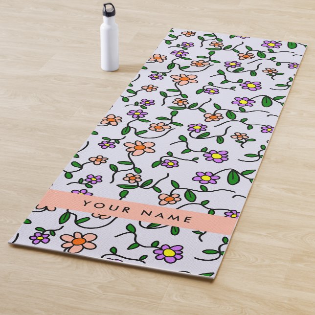 Farbenfrohe Blume, blauer Hintergrund, orange Yogamatte (Beispiel)