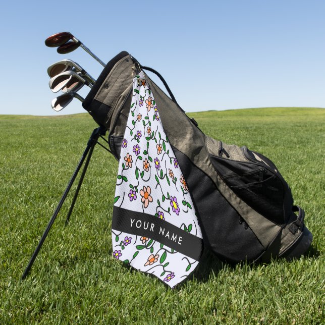 Farbenfrohe Blume, blauer Hintergrund, schwarz Golfhandtuch (Gras)
