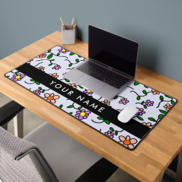 Farbenfrohe Blume, blauer Hintergrund, schwarz Schreibtischunterlage