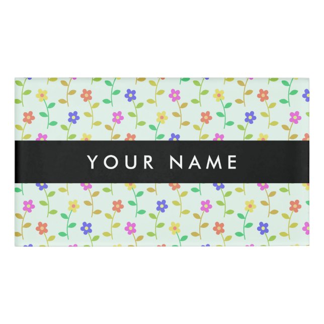 Farbenfrohe Blume, hellgrüner Hintergrund, schwarz Namenschild (Vorderseite)