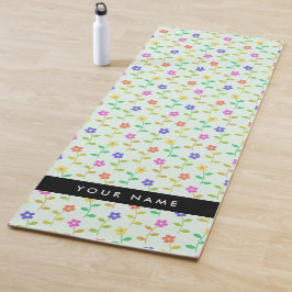 Farbenfrohe Blume, hellgrüner Hintergrund, schwarz Yogamatte