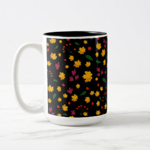 Farbenfrohe Blume und orangefarbene Blätter Zweifarbige Tasse
