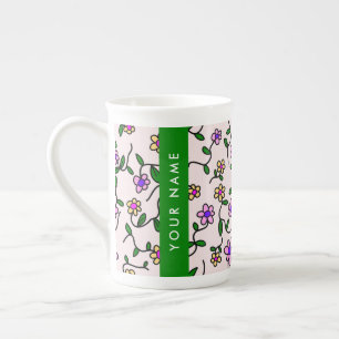 Farbenfrohe Blumen, rosa Hintergrund, Grün Prozellantasse