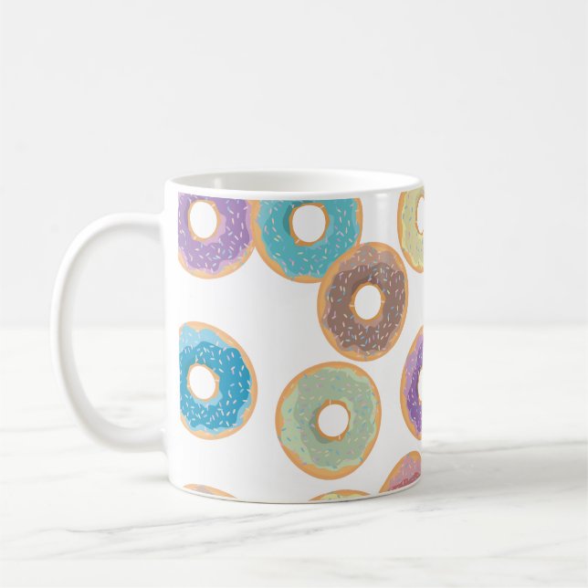 Farbenfrohe Donuts und Sprinklermuster Kaffeetasse (Links)