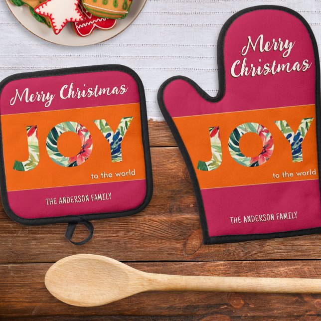 Farbenfrohe festliche Freude an der Welt frohe Wei Ofenhandschuh & Topflappen-Set (A festive Christmas oven glove and pot holder set in orange and pink with 'Joy to the World' words)