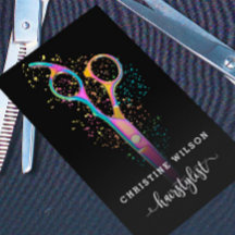 farbenfrohe Friseurschere auf schwarz