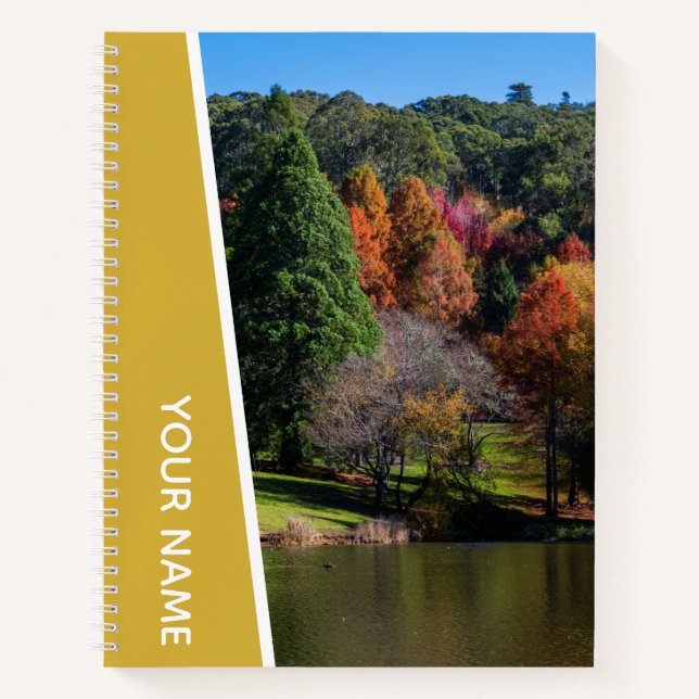 Farbenfrohe Herbstbäume, botanischer Garten Gold Notizbuch (Vorderseite)