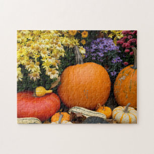 Farbenfrohe Herbstdekoration mit Kürbissen Puzzle