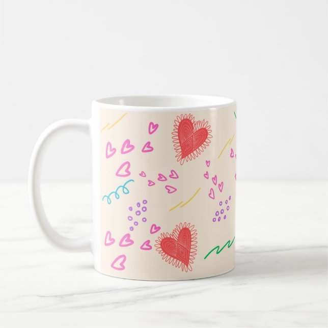 Farbenfrohe Herzmuster Kaffeetasse (Links)