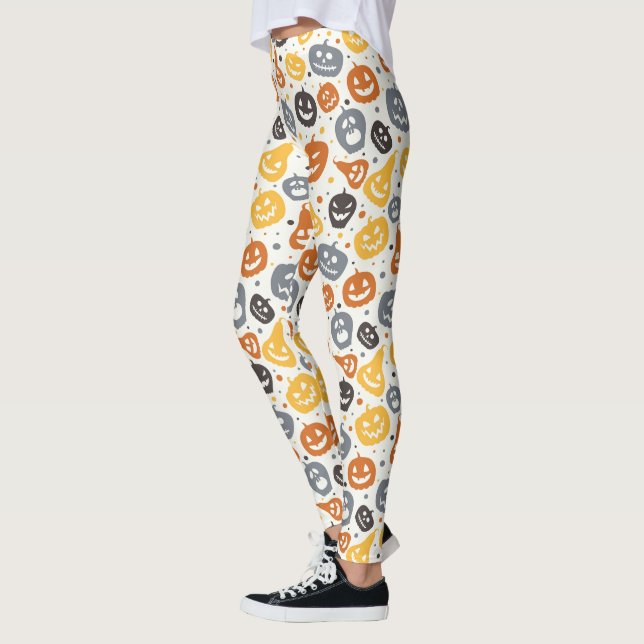 Farbenfrohe Jack-O'-Lantern-Gesichtsmuster Leggings (Links)