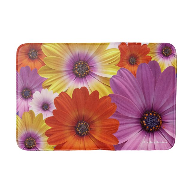 Farbenfrohe Medley von African Daisies Blume Badematte (Vorderseite)