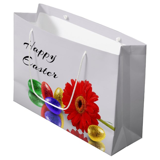 Farbenfrohe Ostereier mit Gerbera Große Geschenktüte (Vorderseite Schrägansicht)