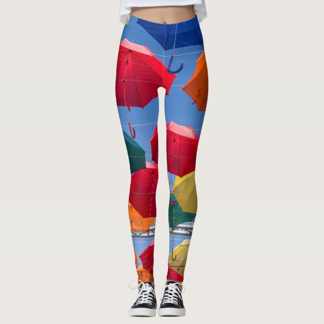Farbenfrohe Regenschirme in himmelblau-orange rot Leggings (Vorderseite)