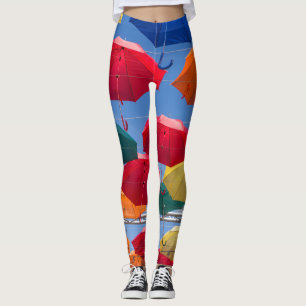 Farbenfrohe Regenschirme in himmelblau-orange rot Leggings