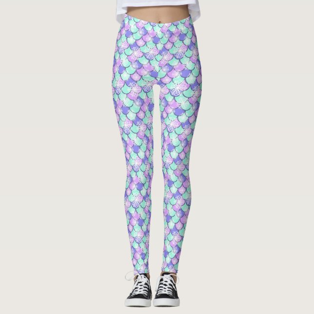 Farbenfrohe Schneeflocke mit Fischskulpturen Leggings (Vorderseite)