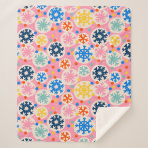 Farbenfrohe Schneeflocken im rosa Urlaubsmuster Sherpadecke