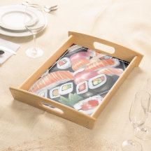 Farbenfrohe Sushi auf schwarzem Platter