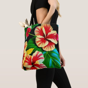 Farbenfrohe tropische Blätter und Hibiskus-Blume