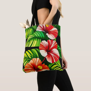 Farbenfrohe tropische Blätter und Hibiskus-Blume