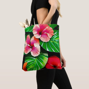 Farbenfrohe tropische Blätter und Hibiskus-Blume