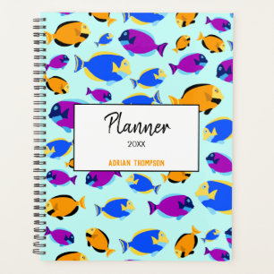 Farbenfrohe tropische Fischmuster im Blauen Meer Planer