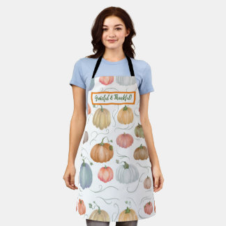 Farbenfrohe Wasserfarbenrebe Kürbispflaster Schürze