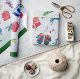 Farbenfrohe Weihnachtsobjekte auf der Seite W Geschenkpapier