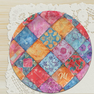 Farbenfroher Patchworkdruck Monogramm Pappteller