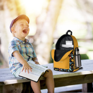 Farbenfrohes Dinosaurier-Muster gelb schwarz Name Bedruckter Rucksack
