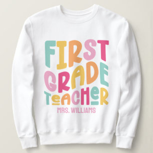 Farbenfrohes Textdesign für Lehrer der ersten Klas Sweatshirt