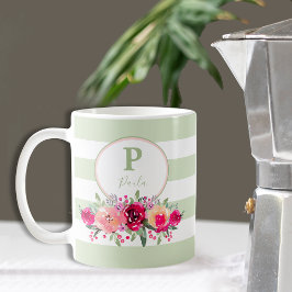 Farbflorenmonogramm mit heiß rosa Farbe auf dem Mi Kaffeetasse