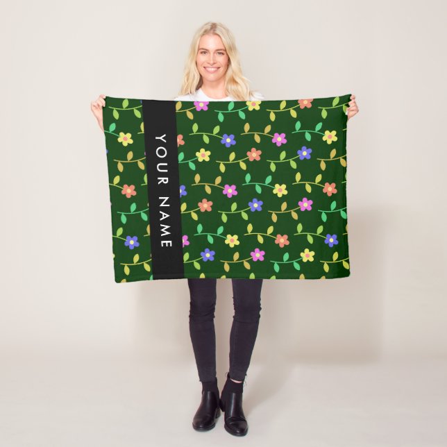 Farbige Blume, grüner Hintergrund, schwarz Fleecedecke (Beispiel)
