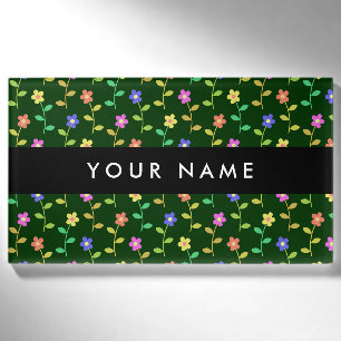 Farbige Blume, grüner Hintergrund, schwarz Namenschild