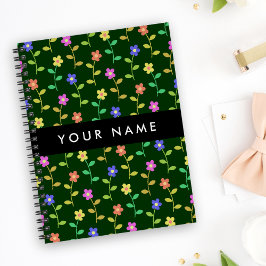 Farbige Blume, grüner Hintergrund, schwarz Notizbuch