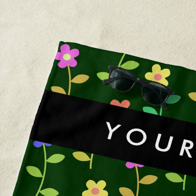 Farbige Blume, grüner Hintergrund, schwarz Strandtuch (Beispiel)