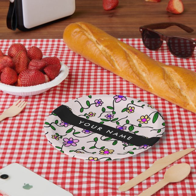 Farbige Blume, rosa Hintergrund, schwarz Pappteller (Picknick)