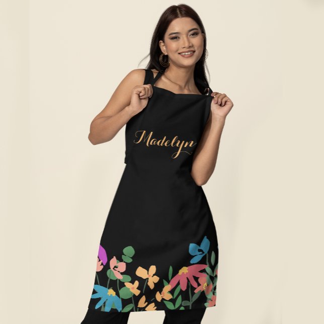 Farbige Blumenschrift Personalisiert Schürze (Personalized colorful florals on black apron.)
