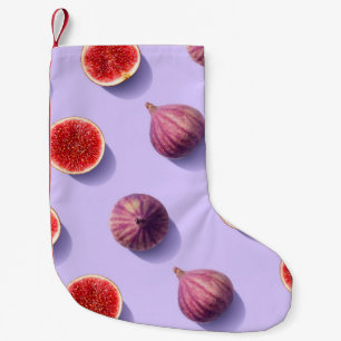 Farbige Fruchtmuster von frischen Feigen auf lila  Kleiner Weihnachtsstrumpf