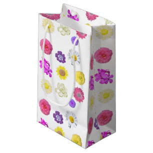 farbige gelbe, weiße, rosa, violette Blumen Kleine Geschenktüte
