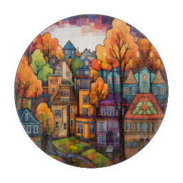 Farbige Häuser und Bäume im Herbst Schneidebrett