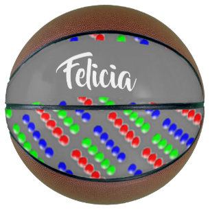 Farbige Perlen auf grauem Boden Basketball