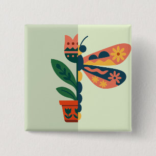 Farbige Schmetterlingsdekoration mit floralen Elem Button