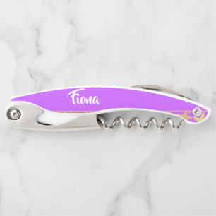 Farbige Seesterne auf lila Kellnermesser