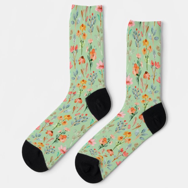 Farbige Wildblumen in Aquarell auf grün Socken (Linkes Detail)