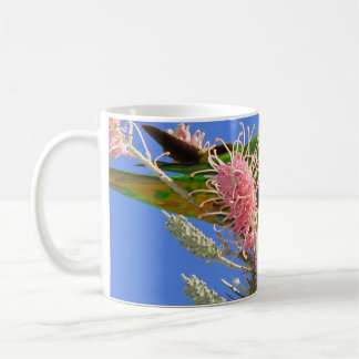 Farbiger Regenbogen-Lori-Vogel, der Nektar isst Kaffeetasse