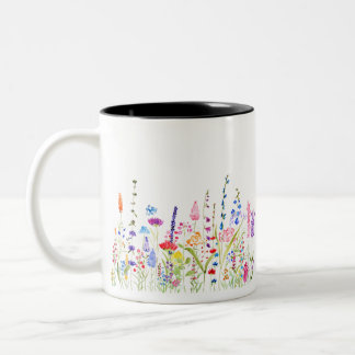 farbiges Feld der wilden Blume Zweifarbige Tasse
