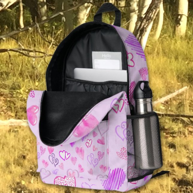 Farbiges Herzmuster über Pastel Lila Bedruckter Rucksack (This sweet purple heart backpack can be used for school, hikes and much more. Fun gift idea)